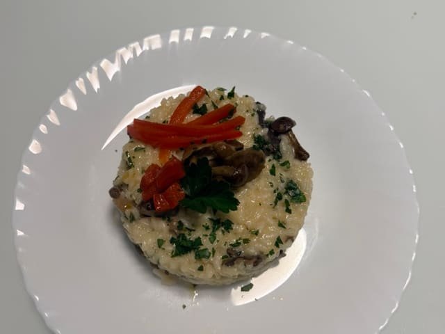 Risotto de setas con pimiento asado y perejil